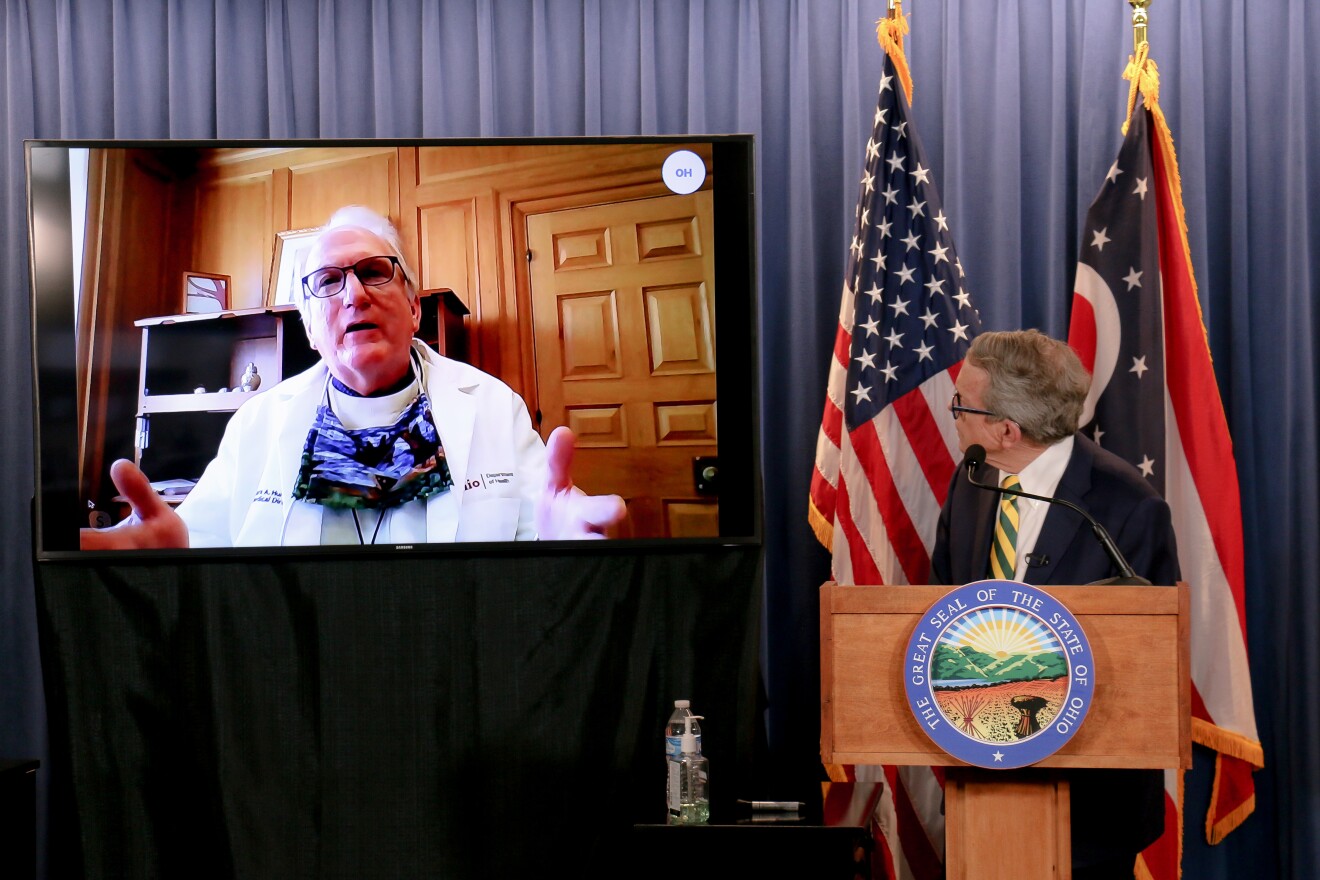 Gov. Mike DeWine and Dr. Mark Hurst, Ohio Department of Health's Medical Director